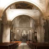 Insomma avvenne un involontario disastro, a cui esperti quali Quintino Quagliati, Carlo Ceschi, Carlo Aru e Franco Schettini cercarono di porre rimedio. Come? �Reinventandosi� un�idea di architettura medievale. 
La pietra calcarea color avorio lasciata a vista, la nudit� delle pareti, la pulizia degli interni, divennero preponderanti nel restyling delle chiese